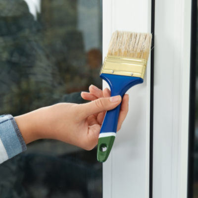 Step-by-step guide on painting uPVC surfaces, including windows, doors, gutters, and downpipes.